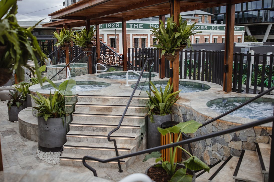 a row of rooftop spas